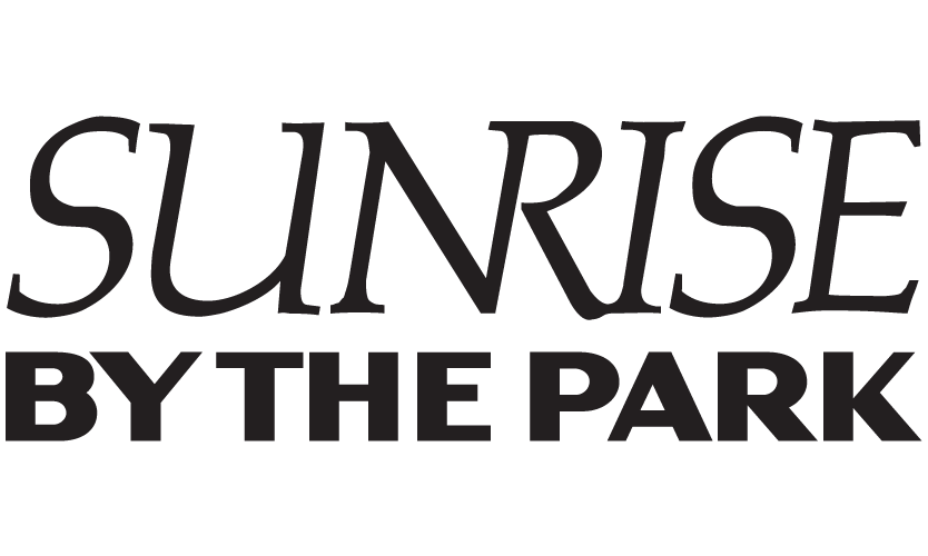 The image features the phrase "Sunrise by the Park" in large, bold letters.